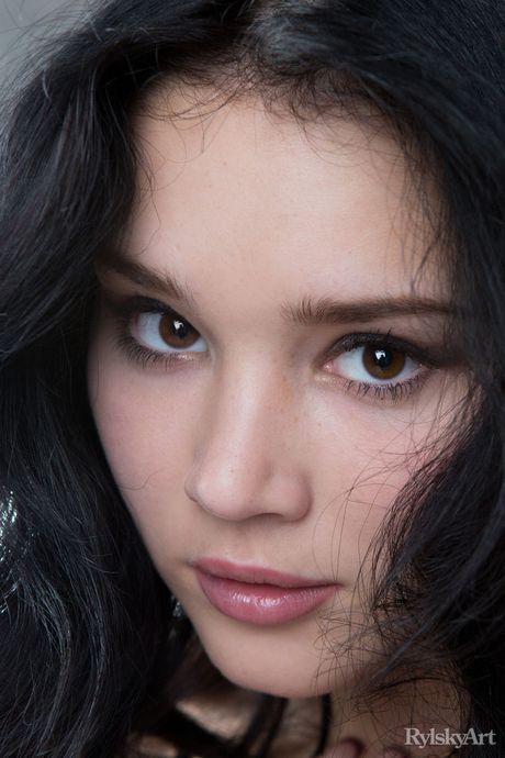 Asian cougar Malena Fendi reveals her big racks and toys her horny pussy