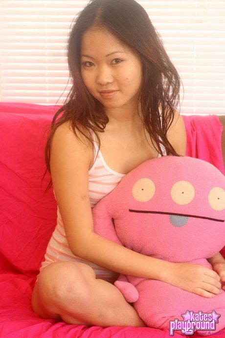 Asian teen Grace strips and shows her big melons and ass in a solo