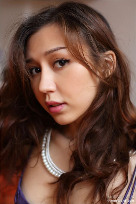 Amazing Asian babe Sakura strips and shows her perfect ass and tits