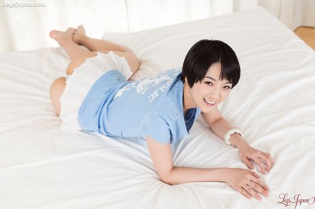 Sexy Asian teen Ai Mukai demonstrates her hot booty and hairy pussy in a solo