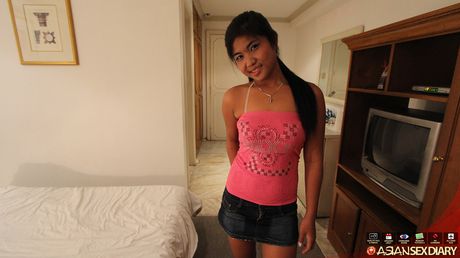 Asian teen Barbie gets her hairy pussy plugged by a horny guy