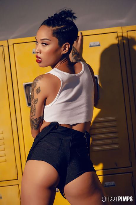 Asian pornstar Honey Gold reveals her big racks and ass in a solo