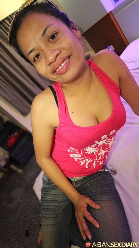 The Asian mom Oam gets her pussy licked and her tits jizzed by a horny guy