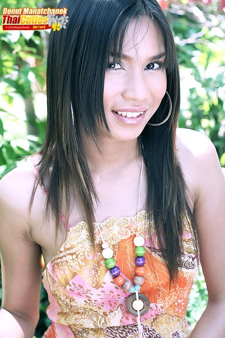 Amazing Asian teen Donut Manatchanok exhibits her tiny tits and hot ass outdoors