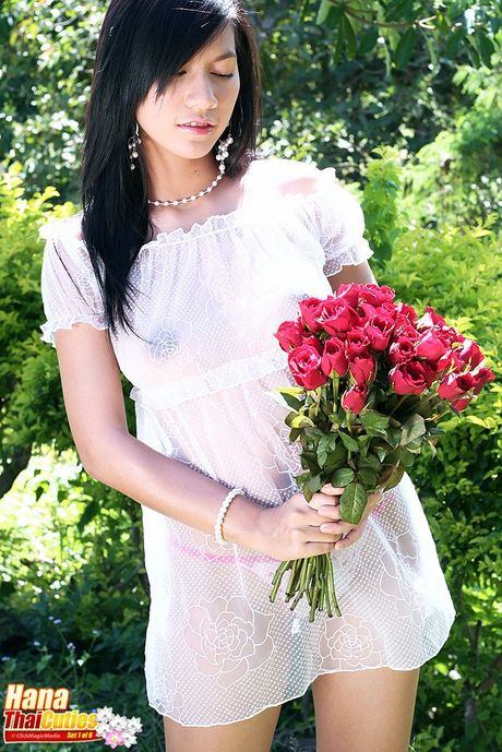 Sexy Asian babe Hana highlights her big racks and ass in a solo outdoors