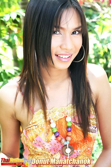 Fantastic Asian teen Donut Manatchanok demonstrates her tiny tits and hairy cunt