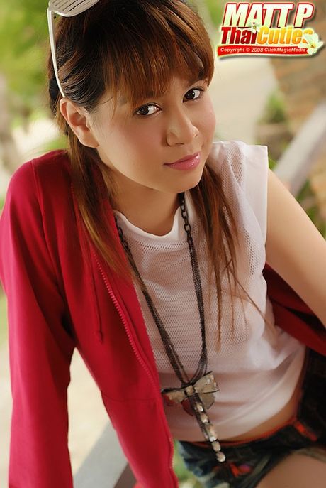 Big titted Asian babe Matt P reveals her ass and tits in a solo