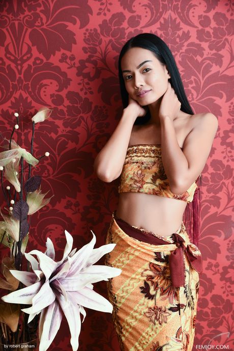 Skinny Asian teen Magen strips and reveals her tiny tits and ass