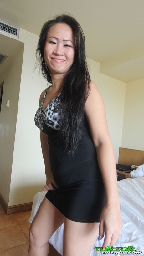 Asian cougar Toon strips and shows her amazing juggs and pink pussy up close