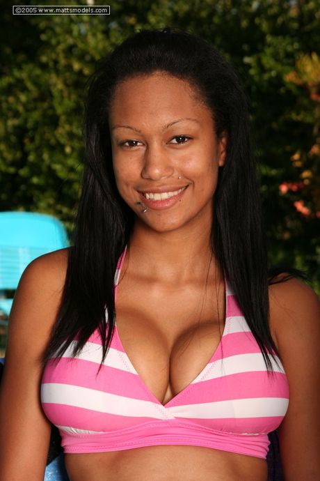 Asian teen Pearl strips and shows her amazing boobs and ass in the pool