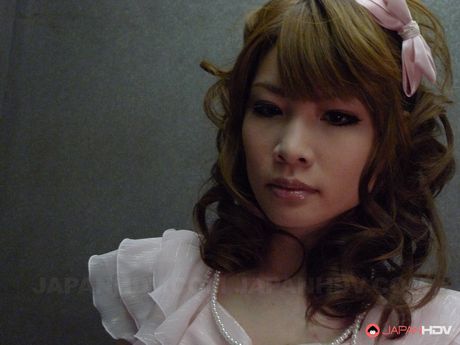 Curly haired gal Shiori Amano seduces a man and blows his big dick