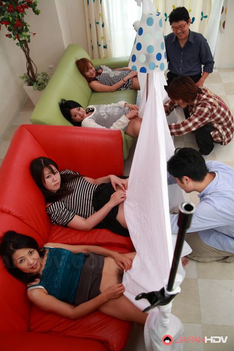 Gorgeous Japanese mature slut teasing her hairy cunt with pleasure