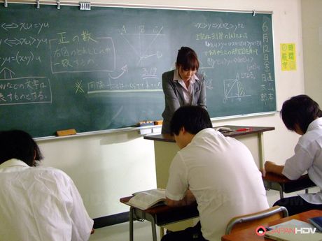Sexy Asian teacher Kyoushi Kan seduces two students and suck them off