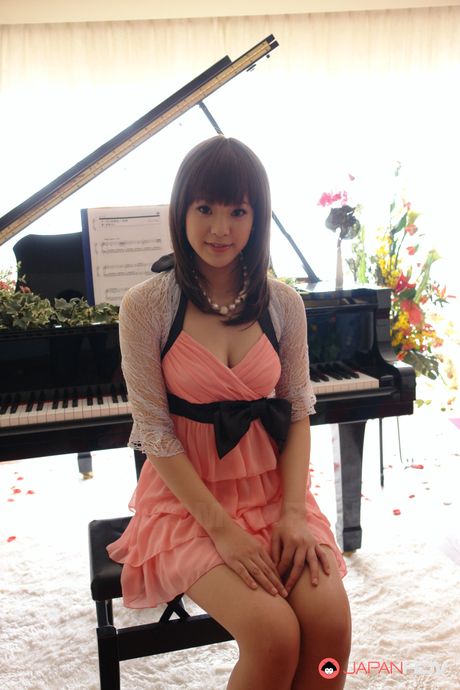 Hot Japanese teen Rimu Endo plays a piano and shows her fine cunt