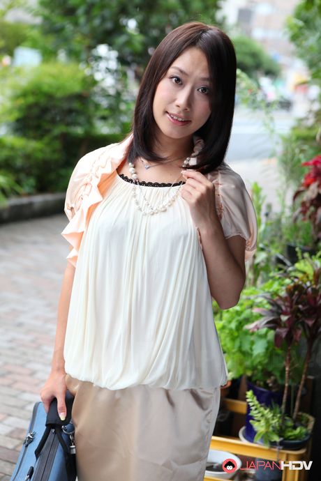 Stunning Japanese cutie Yayoi Yanagida in a sexy dress shows her body