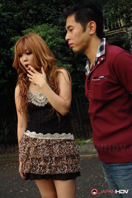 Bright haired Sarina Tsubaki gets down on her knees and sucks cock.