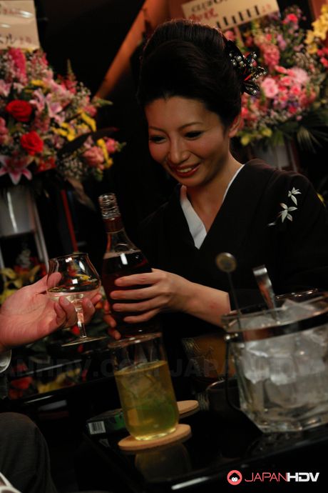 Busty Japanese lady Sayuri Mikami moans while rubbing her wet snatch.