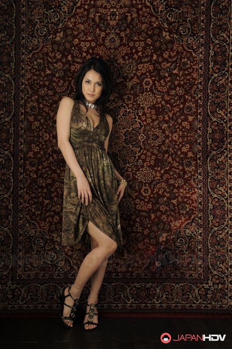 Dreamy Japanese model Maria Ozawa posing and looking horny for cock.