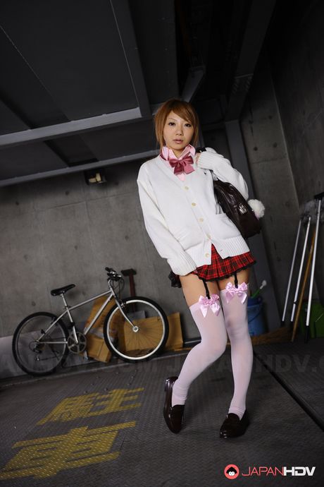 Cute school girl Rui Hazuki poses in her short uniform in parking lot