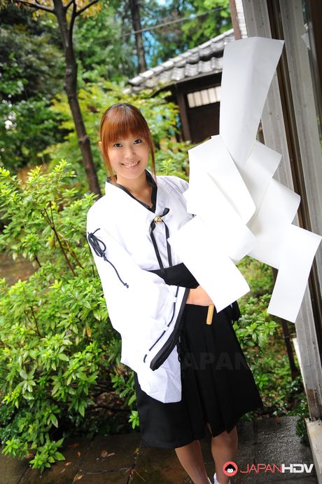 Cute teen girl Yuuno Hoshi enjoys in posing in her room for the camera