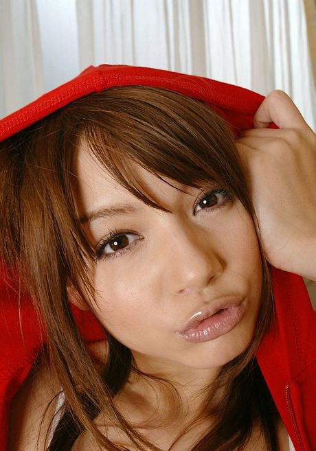 Platinum Asian babe Tina Yuzuki strips and shows her tiny tits and ass