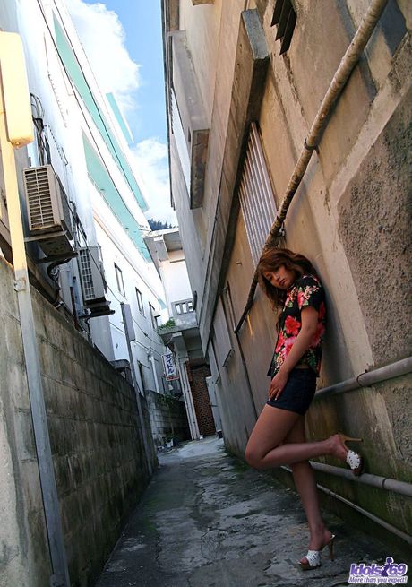 Hot sexy asian model Nao Yoshizaki in action