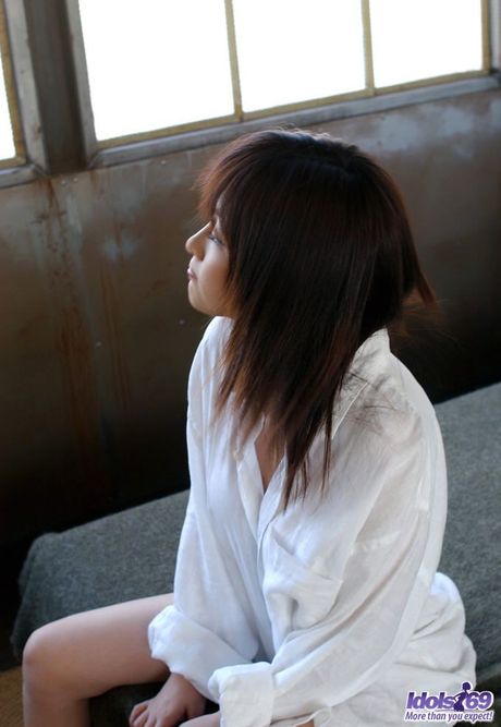 Amazing Japanese babe Sakura Shiratori shows her tiny tits and hairy cunt