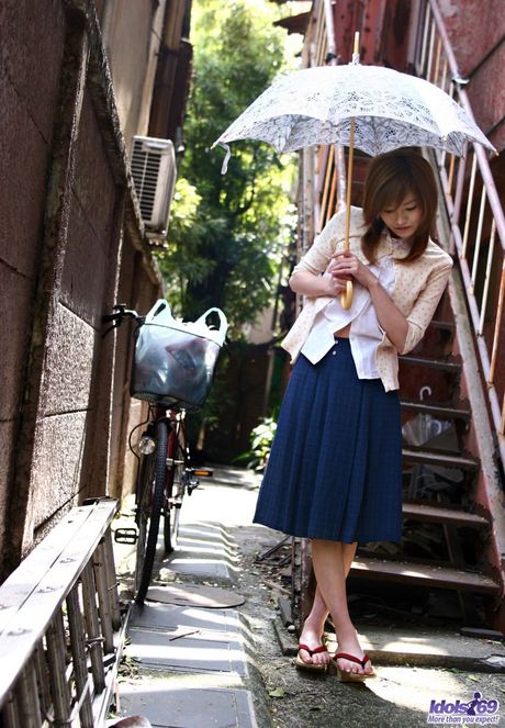 Asian babe Ray Ito strips and shows her tiny tits and ass in a solo