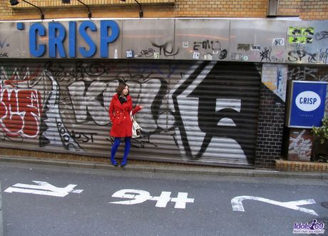 Asian slut removes her clothes and masturbates her hairy pussy with a large toy