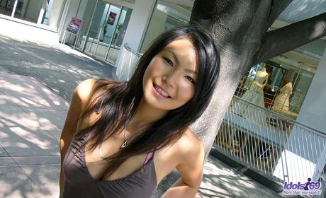 Japanese slut Asami has an excellent ass hiding under that purple sexy thong