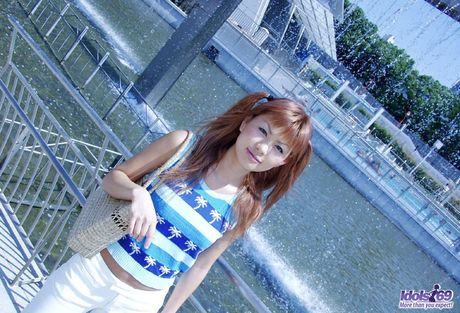 Japanese tramp Aki proudly shows off her tight body and hairy sexy pussy