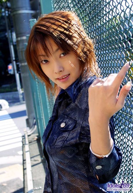 Asian tramp in stockings spreads her legs for an excellent open legs pussy shot