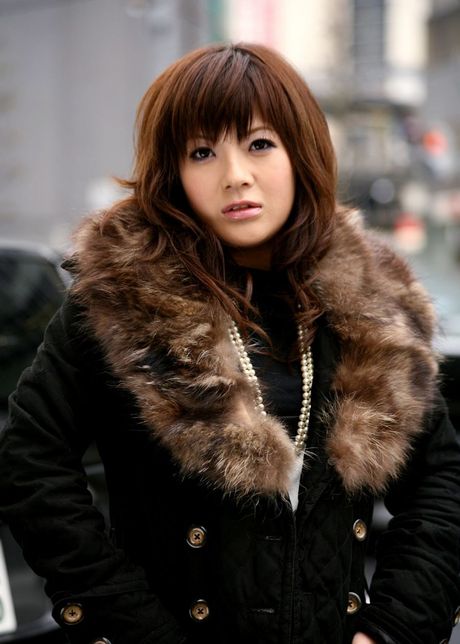 Asian trollop dreams of being a sexual object of lust as she poses for pictures