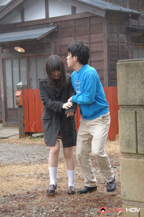 Nasty Mai Shimizu sucks a cock and gets cum in her mouth outdoors.