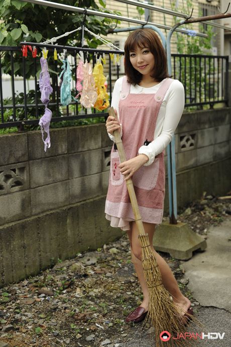 Juri Kitahara shows round boobs and spreads labia of trimmed pussy.