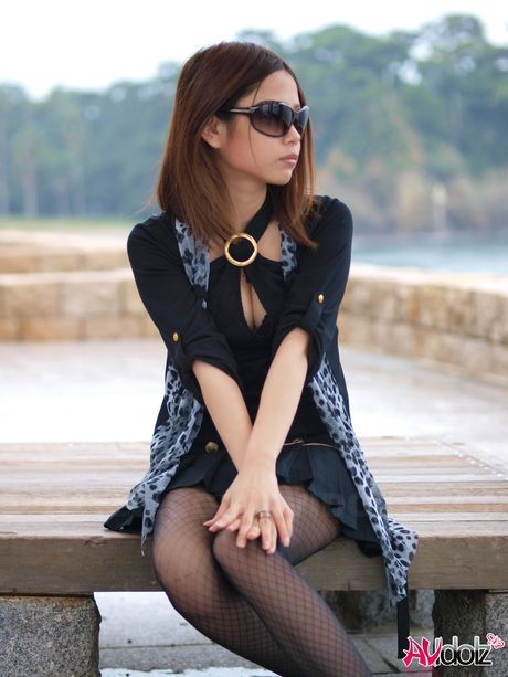 Superb Asian babe Rena strips to her pantyhose and shows her hairy cunt