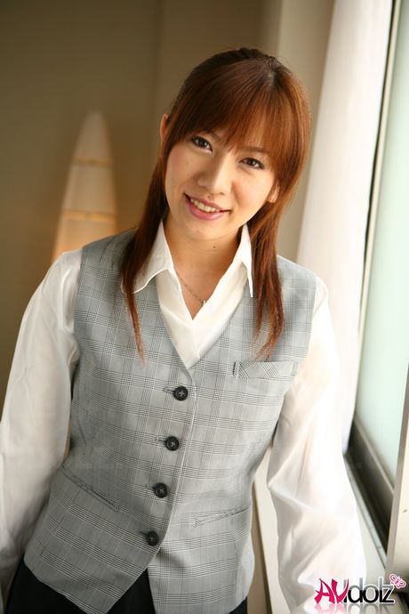 Sexy Japanese babe Aki Yatou strips and shows her tiny tits and ass