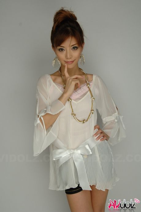 Stunning Asian teen Akane Hotaru strips and shows her perfect tits and ass