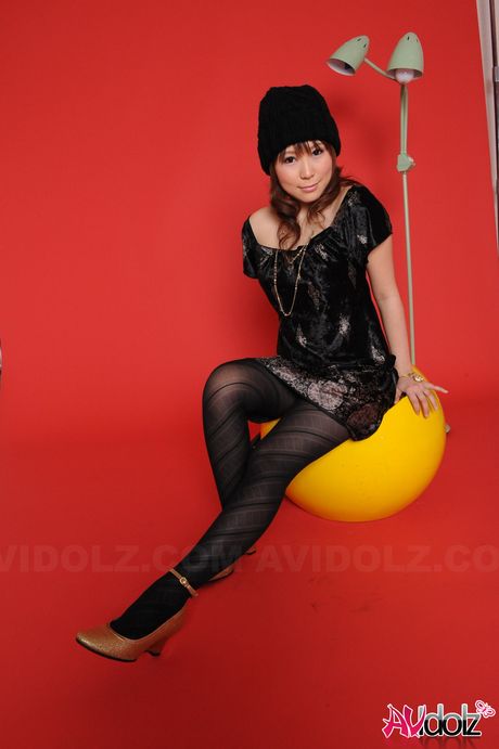 Perfect Japanese babe Yuko Morita strips and shows her tiny tits and ass