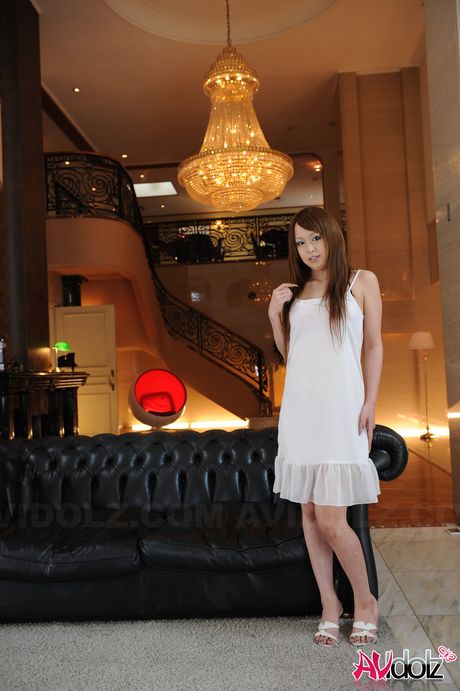 Hot Asian teen Ichika strips and shows her tiny tits and pink pussy