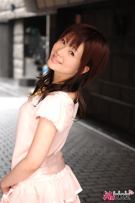 Brunette Japanese babe Hina Kawamura strips and poses nude in the rain