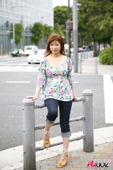 Hot Asian Keiko Morikawa demonstrates her big ass and tits in a solo striptease