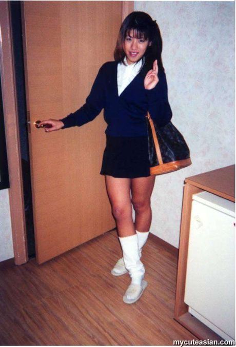 Japanese lady with teen boobs strips and toys her hairy pussy