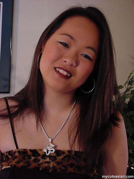 Japanese babe with tiny tits strips and shows her hot ass and pussy