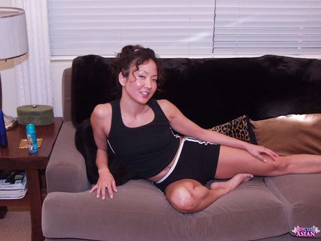 Asian amateur girl strips and toys her pussy and asshole with a dildo