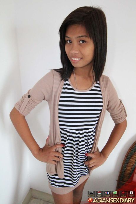 Asian teen Jenelyn strips and shows her tiny tits and shaved pussy