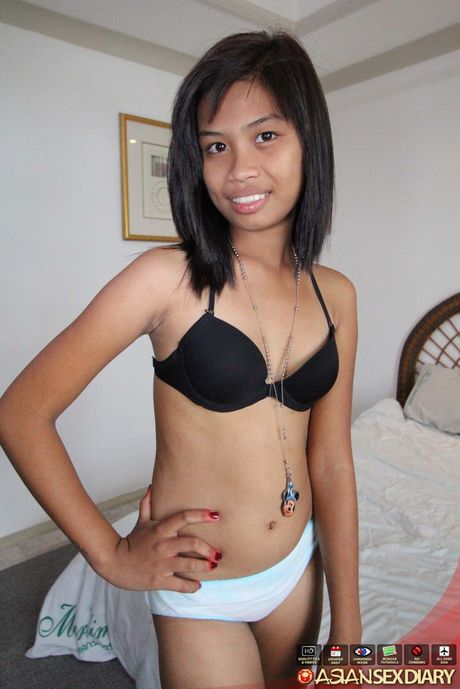 Asian teen Jenelyn strips and shows her tiny tits and shaved pussy