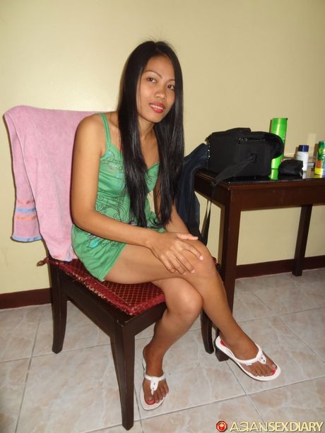 Asian teen Clair strips and shows her hairy pussy up close in a solo