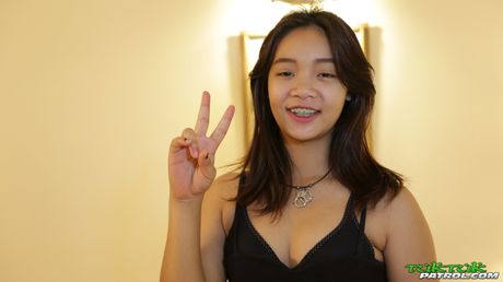 Amateur Asian girl with a tiny tattoo gets her hairy pussy fucked hardcore