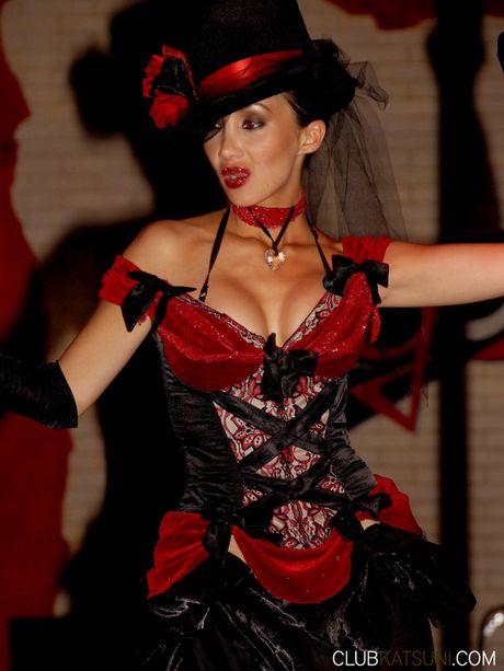 Asian MILF Katsuni flaunts her big juggs and ass in a solo striptease